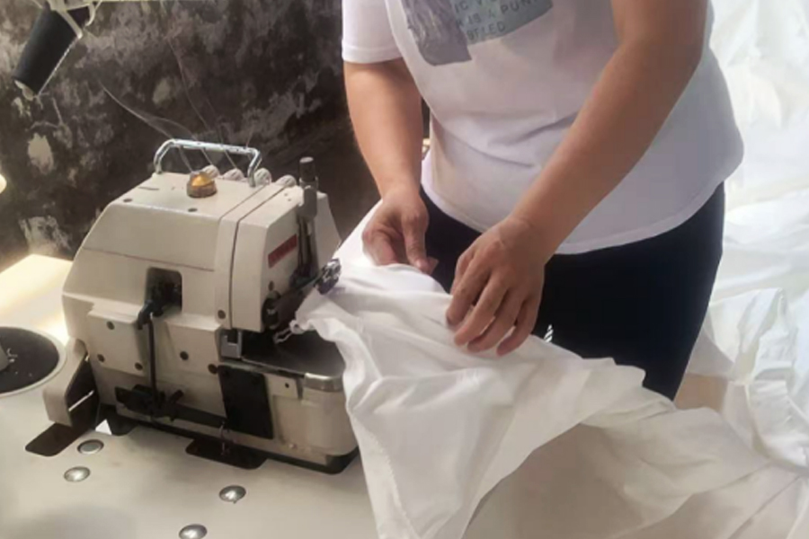 Farging fabrikken produksjon-grå klut sy hodet området